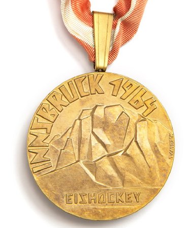Front: Innsbruck 1964 gold medal, legend over Tirol mountains, ice hockey
