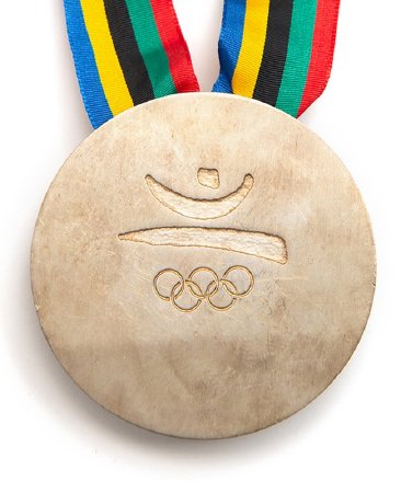 Back: Barcelona 1992 prize medals, Emblem of the Games over Olympic Rings