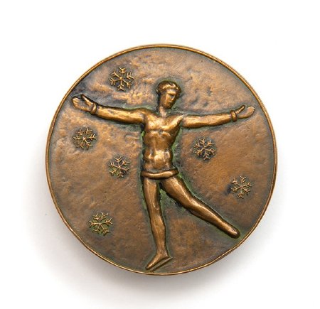 Front: St. Moritz 1928 bronze medal, Female skater with ice crystals