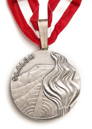 Front: Innsbruck 1976 silver medal, Olympic flame & ski jump, slalom