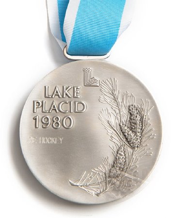 Back: Lake Placid 1980 silver medal, legend with conifer, ice hockey