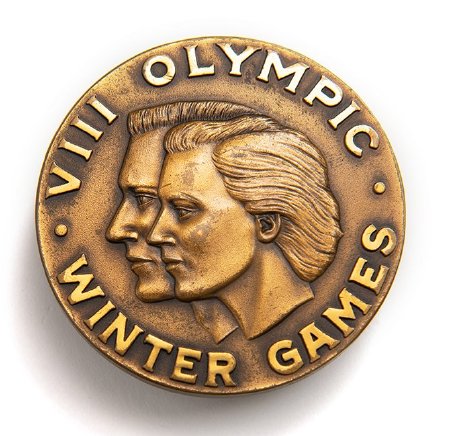 Front: Squaw Valley 1960 bronze medal, male & female head with legend