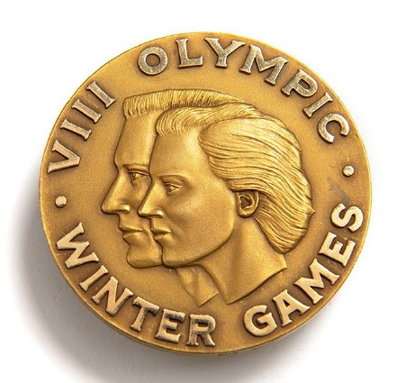 Front: Squaw Valley 1960 gold medal, male & female head with legend