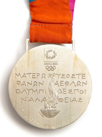 Back: Athens silver medal, Emblem over Greek writing and Olympic cauldron