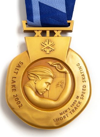Back: Salt Lake gold medal, Nike with speed skating image and text