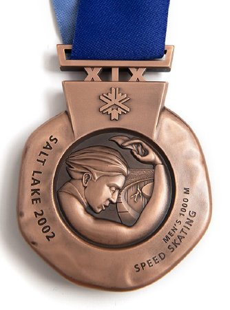 Back: Salt Lake bronze medal, Nike with speed skating image and text