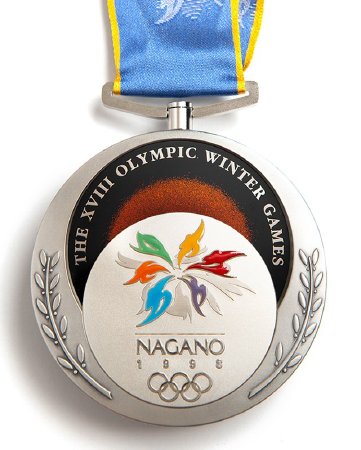Front: Nagano silver medal, Olympic emblem and legend in olive branches