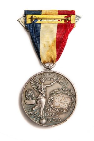 Back: St. Louis 1904 silver medal, Nike with bust of Zeus