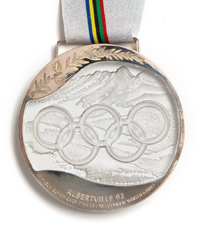 Front: Albertville 1992 silver medal, Olympic rings over alpine landscape