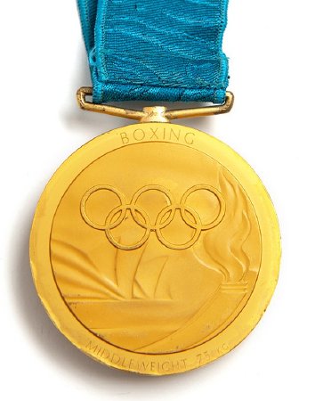 Back: Sydney 2000 gold medal, Olympic rings and Opera House, boxing