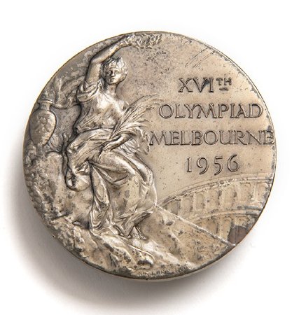 Front: Melbourne 1956 silver medal, seated Nike, Colosseum in background