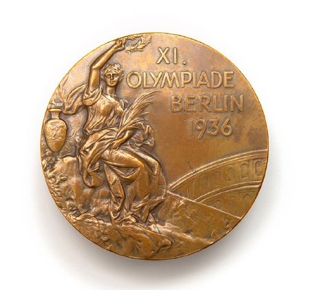 Front: Berlin 1936 bronze medal, seated Nike, Colosseum in background