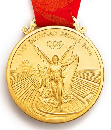 Front: Beijing gold medal, Nike in stadium with legend and Olympic rings