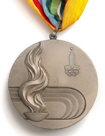 Back: Moscow 1980 prize medals, Olympic flame over stadium & emblem