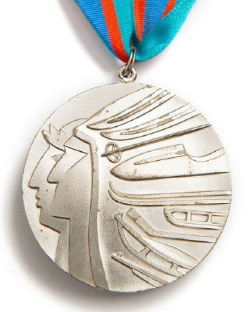 Front: Calgary 1988 silver medal, laureated athlete and Native American