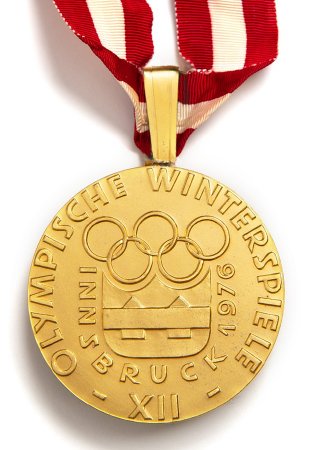 Back: Innsbruck 1976 prize medals, Innsbruck Olympic emblem with legend