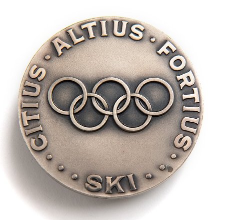 Back: Squaw Valley 1960 silver medal, Olympic motto & rings, Skiing