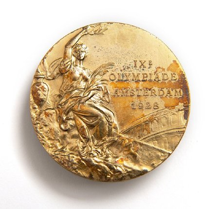 Front: Amsterdam 1928 gold medal, Nike seated holding laurel wreath