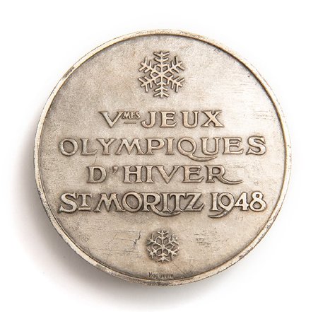 Front: St. Moritz 1948 silver medal, French legend between snow crystals