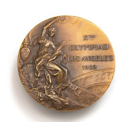 Front: Los Angeles 1932 bronze medal, seated Nike, Colosseum in background