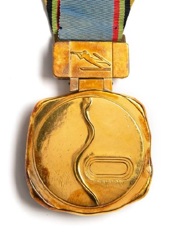 Front: Sapporo 1972 gold medal, ski trail and speed skating stadium