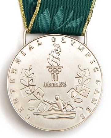 Back: Atlanta silver medal, Atlanta emblem with canoe/kayak pictogram
