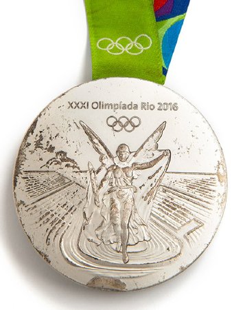 Front: Rio 2016 silver medal, Nike in stadium, Olympic rings and legend