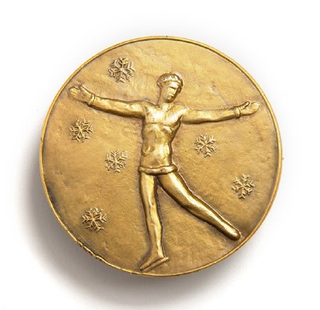 Front: St. Moritz 1928 gold medal, Female skater with ice crystals