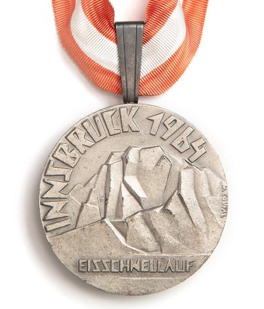 Front: Innsbruck 1964 silver medal, legend over mountains, speed skating
